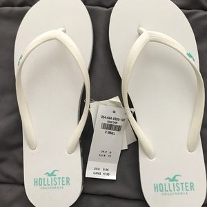 White hollister flip flops